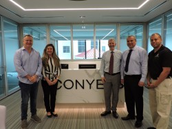 Conyers Cayman Office Celebrates 90th anniversary with furniture donation