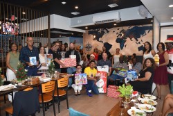 TAB Staff donate dozens of gifts to toy drive